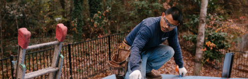 man doing replacement of roof