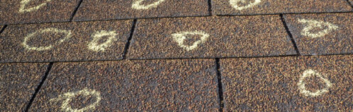 hail damage - common cause of home roof leaks